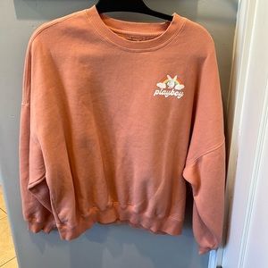 PacSun/Playboy size small salmon sweatshirt.